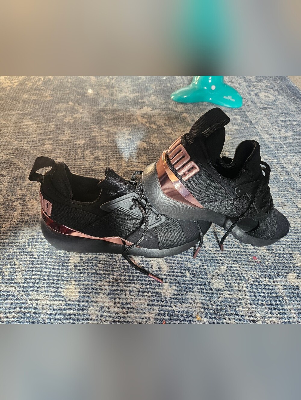 PUMA Women’s Black Sneakers with Rose Gold Accent